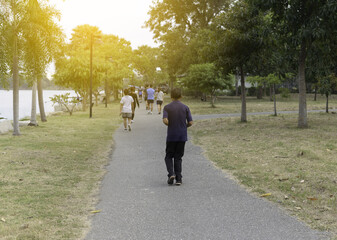 People jogging in the park in the afternoon