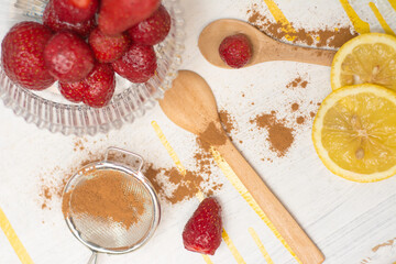 Sweet strawberry kitchen dessert - cinnamon, yellow, lemon, spoon