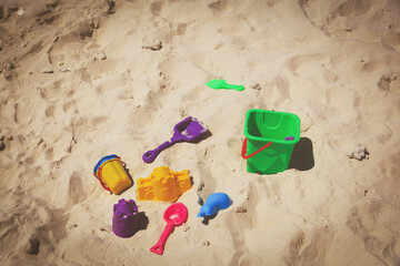 Fototapeta na wymiar kid toys on tropical sand beach