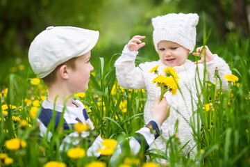 Children in a field of flowers