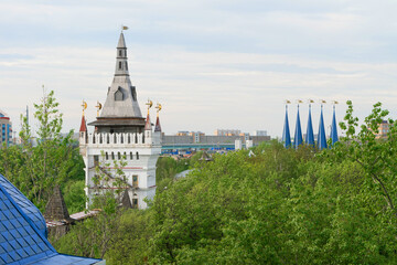 The towers of the cultural and entertainment complex of the Kremlin in Izmaylovo rise above modern Moscow, Russia.
