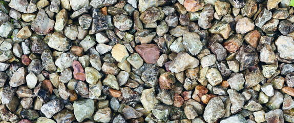 Background and texture of crushed stone. Panorama. View from above.