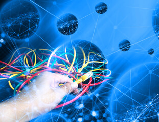 hand hold lan plug and blue network background graphic