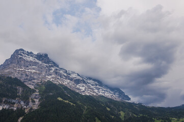 Fototapeta premium Grindelwald, Dorf, Kleine Scheidegg, Eiger, Eigernordwand, Lauberhorn, Unwetter, Berner Oberland, Alpen, Schweizer Berge, Frühling, Sommer, Schweiz