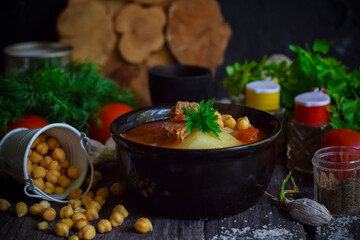 Tomato soup with beef, vegetables and chickpeas