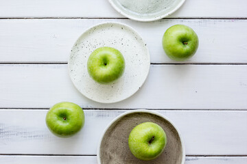 summer food with green apples on white background top view