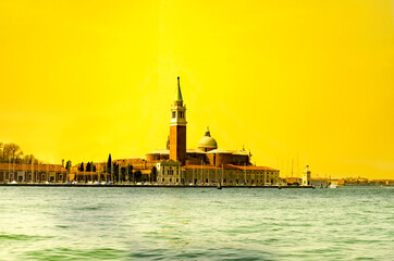 Calm morning with view of San Giorgio Maggiore island in warm summer Venice, Italy