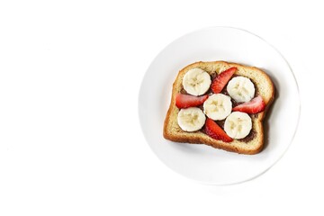 Fototapeta na wymiar Strawberry banana breakfast Toast isolated on white