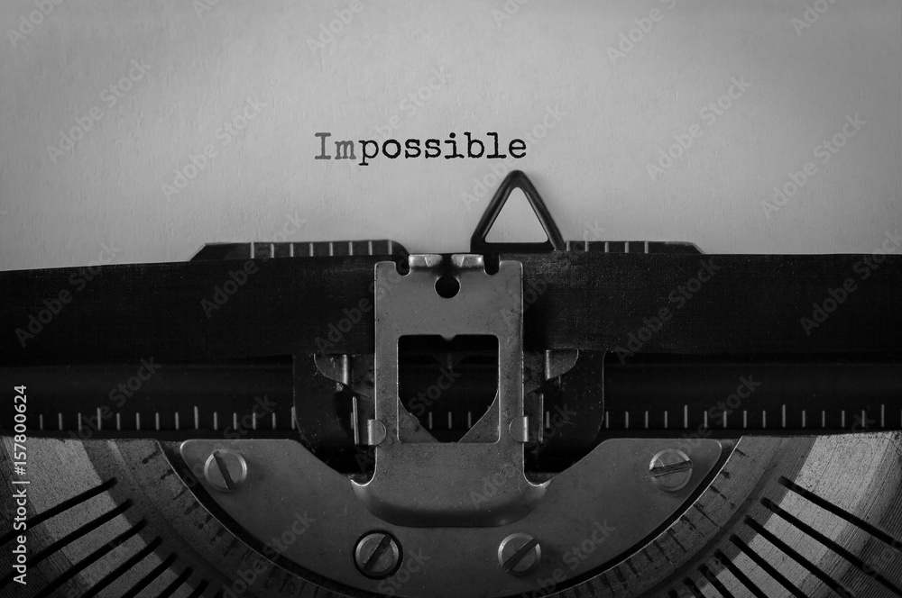 Poster text impossible typed on retro typewriter
