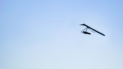 Hang Glider at clear blue sky