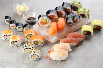 sashimi sushi set with soy - sushi roll with salmon and sushi roll with smoked eel