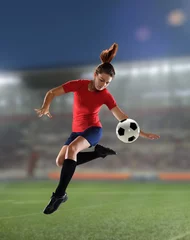 Foto op Canvas Young woman playing soccer © Carlos Santa Maria