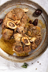 Ossobuco. Braised cross-cut beef shanks.