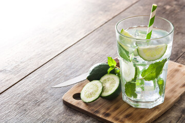Mojito cocktail in glass on wooden table
