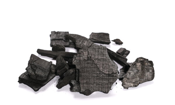 pile charcoal isolated on white background, xylanthrax, wood coal 