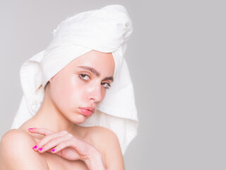 girl with white bath towel on head