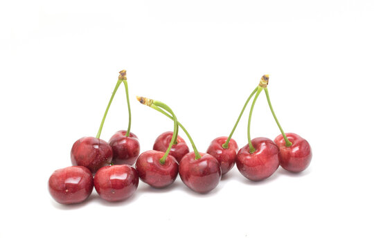  Sweet cherries isolated on white background
