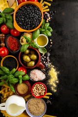 Food background Food Concept with Various Tasty Fresh Ingredients for Cooking. Italian Food Ingredients. View from Above with Copy Space.