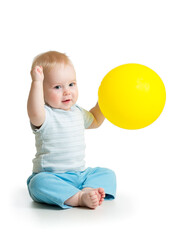 Cute baby boy with yellow balloon