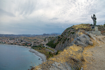 Madonna del Mare (Our Lady of the Sea) statue and Bova Marina Town aerial view - Bova Marina,...