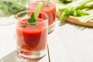 Two glasses of tomato juice.