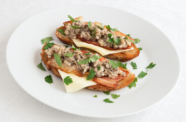 cep caviar on toast with cheese and bacon