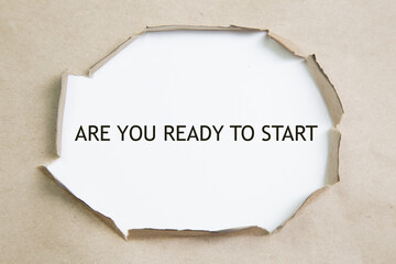 are you ready to start written under torn paper - obrazy, fototapety, plakaty