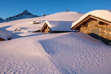 Huts at the Alpe Prabello, Prabello Alp at the sunset, Valmalenco, Valtellina, Italy