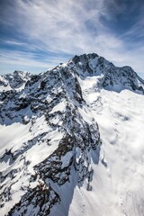 Aerial view of the north wall of Monte Disgrazia, Disgrazia Mount, covered with snow and ice, Valmalenco, Valtellina, Italy