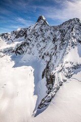 Aerial view of the north wall of Monte Disgrazia, Disgrazia Mount, covered with snow and ice, Valmalenco, Valtellina, Italy
