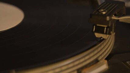 Record player playing an old fashioned vintage vinyl record