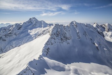 Naklejka premium Aerial view of Cima di Vezzeda, Cima di Rosso and Mount Disgrazia. Forno valley, Engadine, Canton Grigioni, Switzerland.