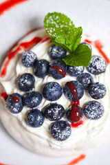 meringue dessert with fresh berries