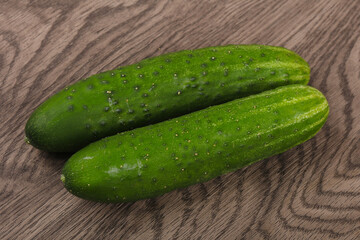 Two green cucumbers