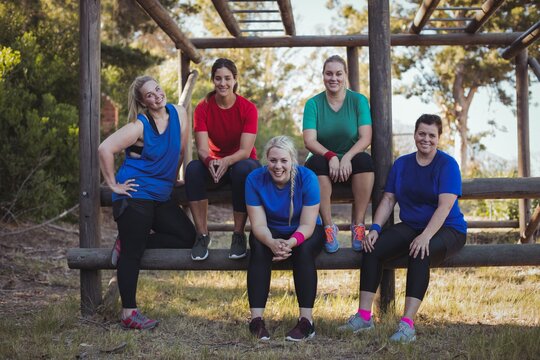 Group of fit women relaxing together in the boot camp