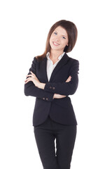 Portrait of young smiling businesswoman standing with hands folded against isolated on white background