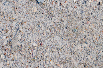 Texture Of Dusty, Dirty Asphalt On A Sunny Day.