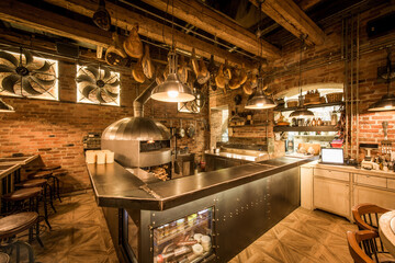 Interior of tavern with old pizza oven