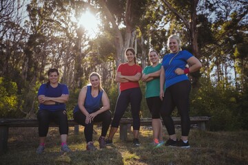 Group of fit women relaxing together in the boot camp