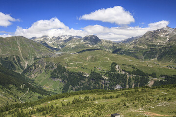 Fototapeta na wymiar Panoramic view on the High Spluga Valley from Pian dei Cavalli. CHiavenna Valley. Valtellina. Lombardy. Italy. Europe