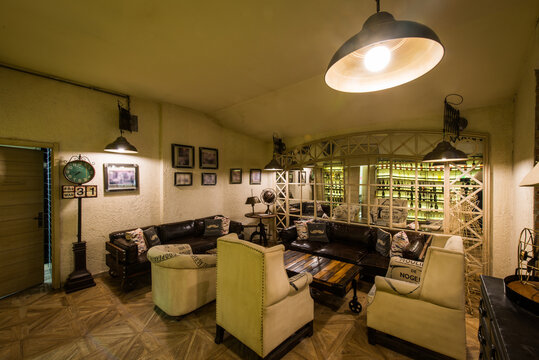 Luxury sofa seats in modern caffe bar or hotel reception