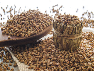 buckwheat groats and wooden spoon