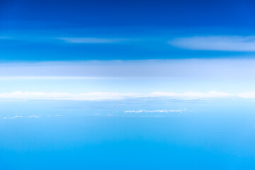 Obraz na płótnie Canvas Clouds, a view from airplane window