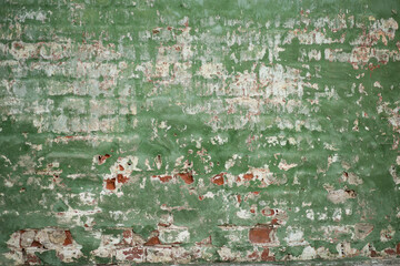 Fototapeta premium brick wall, painted with green paint, background, texture