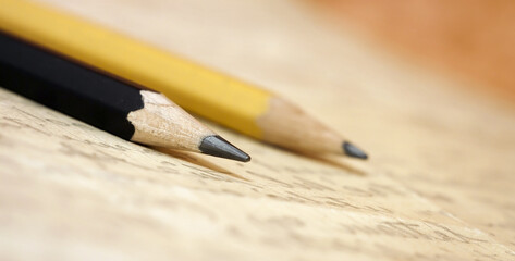 Website banner of pencils and handwriting letter