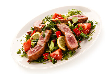 Beef with vegetables on white background