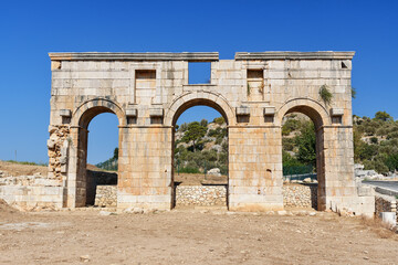 Fototapeta na wymiar Arch of Mettius Modestus in ancient Lycian city Patara. Turkey