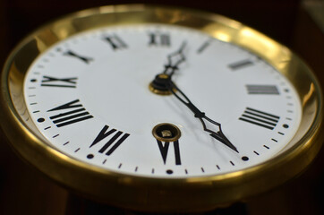 Close-up of a hand of a vintage clock