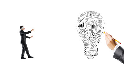 Concept of risk and difficulty with blind businessman steping carefully
