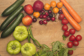Fresh fruits and vegetables on the wood table